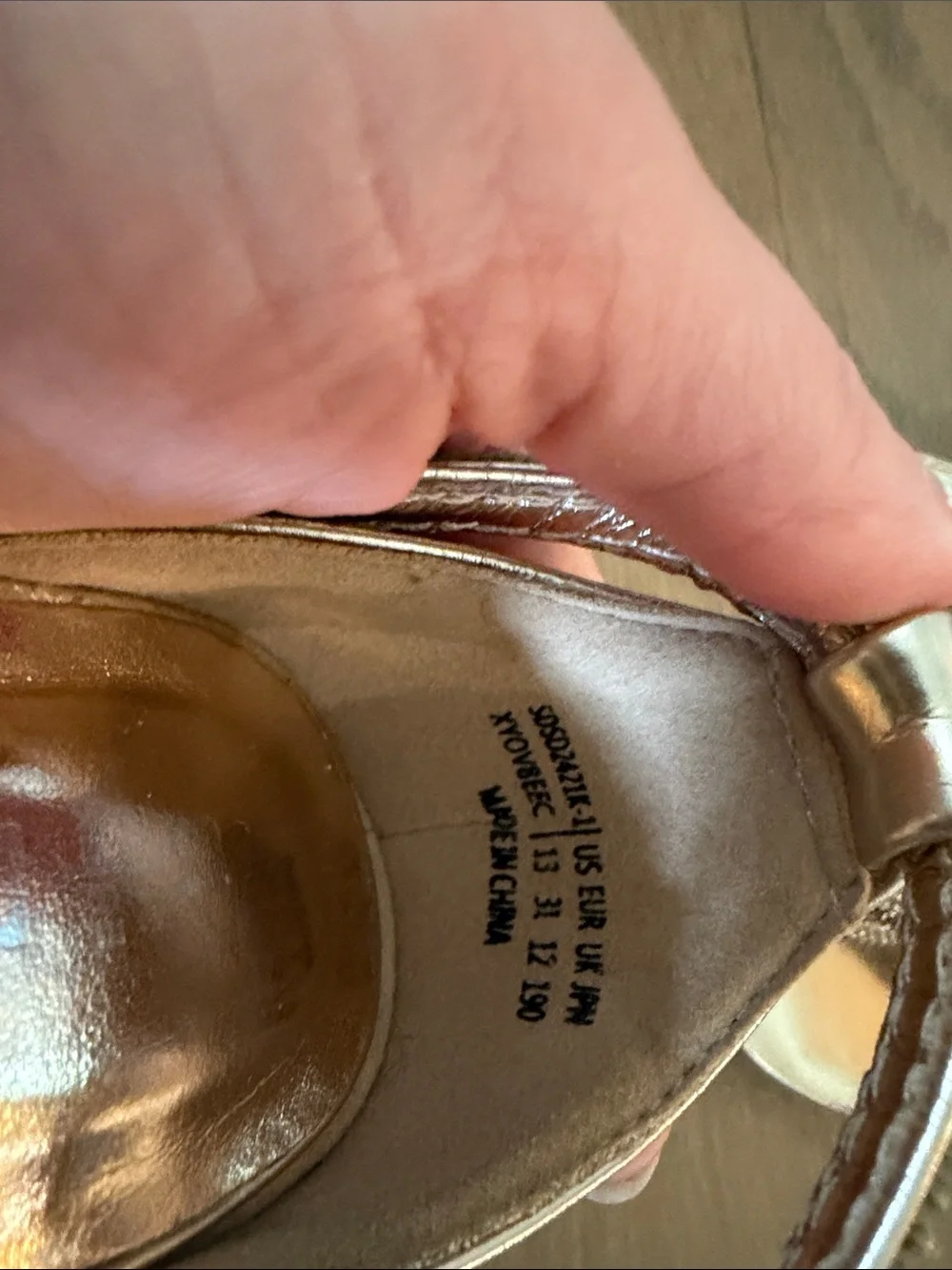 Elegant Metallic Rose Gold Heeled Sandals with Decorative Knot